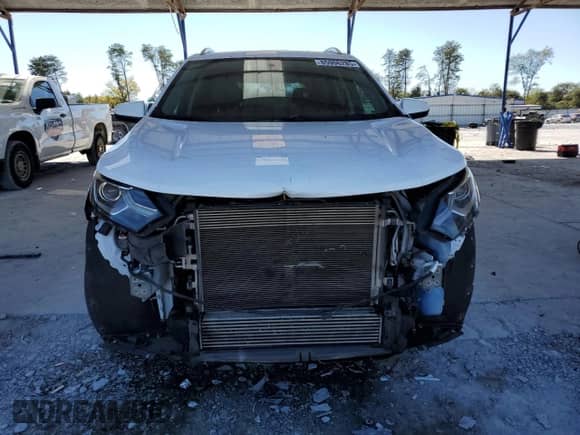 2018 Chevrolet Equinox LT с VIN 2GNAXJEV3J6239925, выставлен на аукционе Copart как лот 85906285 с пробегом 128 133 миль миль и Списание • Salvage title. История ставок и продаж доступна на DreamBid. Изображение 5.