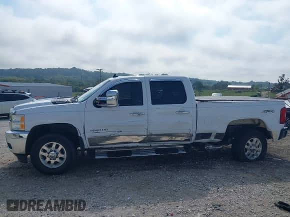 2013 Chevrolet Silverado 2500HD LTZ with VIN 1GC1KYCG7DF151006, listed as a IAAI auction lot 43263484 with 129,989 mi miles and . Bid and sale history available at DreamBid. Image 14.