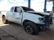 ✅ 2021 Toyota Tacoma SR • VIN: 3TYSX5ENXMT003517 • Lot: 65037425. Listed on Copart with 169,266 mi. Free auction sales archive from the USA and detailed vehicle history report at DreamBid. Image 4.