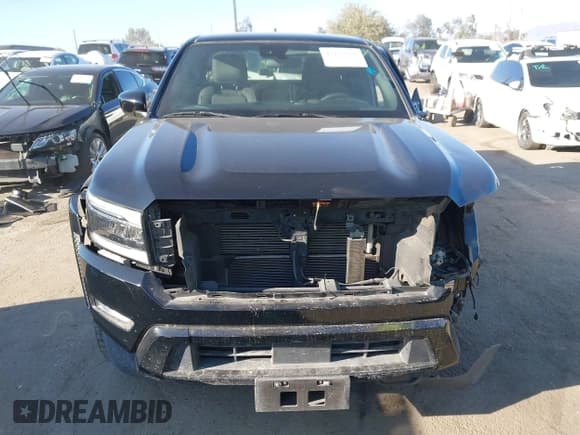 ✅ 2023 Nissan Frontier Pro-X • VIN: 1N6ED1EJ9PN608479 • Lot: 43426950. Listed on IAAI with 56,771 mi. Free auction sales archive from the USA and detailed vehicle history report at DreamBid. Image 12.