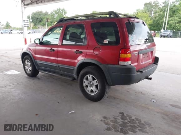 ✅ 2003 Ford Escape XLT Popular • VIN: 1FMYU03173KD91910 • Lot: 43080445. Wystawiony na IAAI z przebiegiem 144 311 mil. Bezpłatny archiwum sprzedaży aukcyjnych z USA i szczegółowy raport historii pojazdu na DreamBid. Zdjęcie 3.