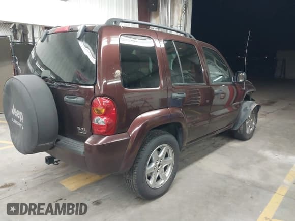 ✅ 2004 Jeep Liberty Limited • VIN: 1J4GK58K64W205203 • Lot: 41845473. Listed on IAAI with 121,486 mi. Free auction sales archive from the USA and detailed vehicle history report at DreamBid. Image 4.