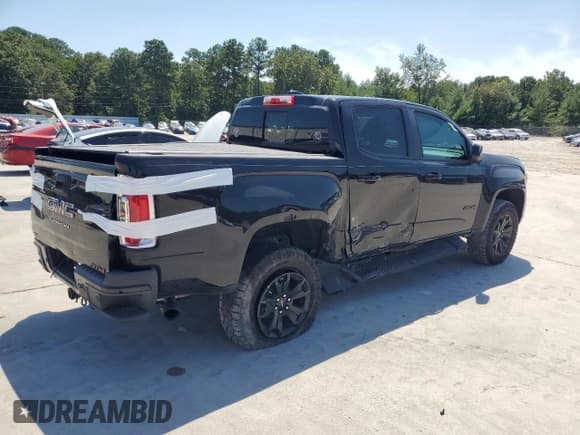 ✅ 2022 GMC Canyon 4WD AT4 • VIN: 1GTG6FEN2N1215238 • Лот: 70363545. Опубликован ранее на Copart с пробегом 63 938 миль. Бесплатный доступ к архиву аукционных продаж из США и подробный отчёт об истории автомобиля на DreamBid. Изображение 3.