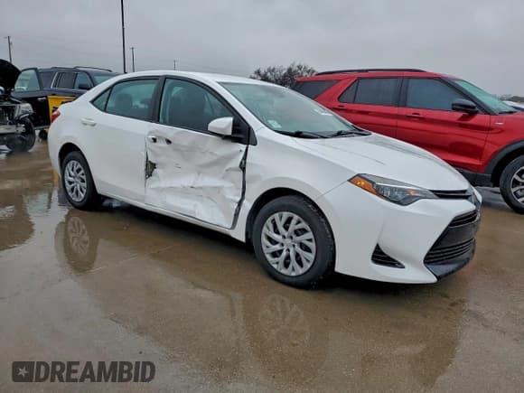 ✅ 2018 Toyota Corolla SE • VIN: 5YFBURHE1JP801769 • Lot: 94480485. Listed on Copart with 81,483 mi. Free auction sales archive from the USA and detailed vehicle history report at DreamBid. Image 4.