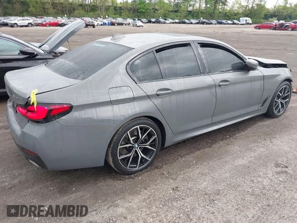 ✅ 2021 BMW 5 Series 540i xDrive • VIN: WBA73BJ0XMWX06571 • Lot: 42169757. Listed on IAAI with 62,013 mi. Free auction sales archive from the USA and detailed vehicle history report at DreamBid. Image 4.