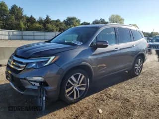 ✅ 2018 Honda Pilot Touring • VIN: 5FNYF6H91JB005668 • Лот: 85587675. Опубликован ранее на Copart с пробегом 104 956 миль. Бесплатный доступ к архиву аукционных продаж из США и подробный отчёт об истории автомобиля на DreamBid. Изображение 1.