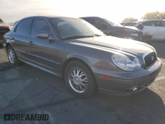 2002 Hyundai Sonata с VIN KMHWF25S32A527229, выставлен на аукционе Copart как лот 86625724 с пробегом 71 042 миль миль и Чистый • Clean title. История ставок и продаж доступна на DreamBid. Изображение 4.