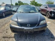 ✅ 2003 Mazda Protege DX • VIN: JM1BJ225930136559 • Lot: 63945475. Wystawiony na Copart z przebiegiem 63 151 mil. Bezpłatny archiwum sprzedaży aukcyjnych z USA i szczegółowy raport historii pojazdu na DreamBid. Zdjęcie 5.