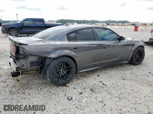 ✅ 2023 Dodge Charger Scat Pack • VIN: 2C3CDXGJ2PH702131 • Лот: 70379055. Опубликован ранее на Copart с пробегом 11 889 миль. Бесплатный доступ к архиву аукционных продаж из США и подробный отчёт об истории автомобиля на DreamBid. Изображение 3.