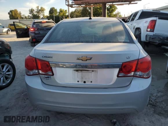 2014 Chevrolet Cruze 2LT с VIN 1G1PE5SB2E7301131, выставлен на аукционе Copart как лот 86685185 с пробегом 126 081 миль миль и Списание • Salvage title. История ставок и продаж доступна на DreamBid. Изображение 6.