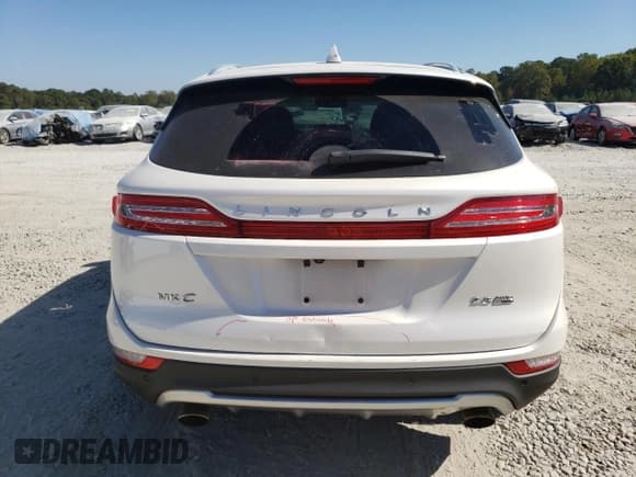 ✅ 2016 Lincoln MKC Select • VIN: 5LMTJ2DH2GUJ29987 • Lot: 77455344. Listed on Copart with 124,072 mi. Free auction sales archive from the USA and detailed vehicle history report at DreamBid. Image 6.