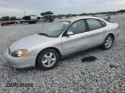✅ 2002 Ford Taurus SES Standard • VIN: 1FAFP55252G264991 • Lot: 71697715. Listed on Copart with 214,647 mi. Free auction sales archive from the USA and detailed vehicle history report at DreamBid. Image 1.