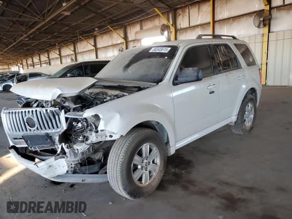 ✅ 2011 Mercury Mariner • VIN: 4M2CN8B73BKJ04913 • Lot: 88345615. Listed on Copart with 215,124 mi. Free auction sales archive from the USA and detailed vehicle history report at DreamBid. Image 1.