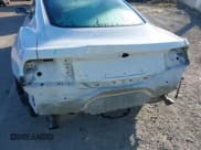 ✅ 2016 Ford Mustang V6 • VIN: 1FA6P8AM7G5301910 • Lot: 43393740. Listed on IAAI with 59,878 mi. Free auction sales archive from the USA and detailed vehicle history report at DreamBid. Image 6.