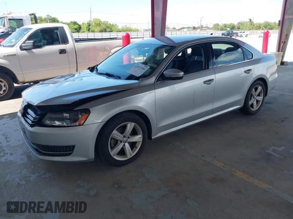 ✅ 2014 Volkswagen Passat S • VIN: 1VWAT7A32EC056635 • Lot: 42871904. Listed on IAAI with 87,686 mi. Free auction sales archive from the USA and detailed vehicle history report at DreamBid. Image 2.