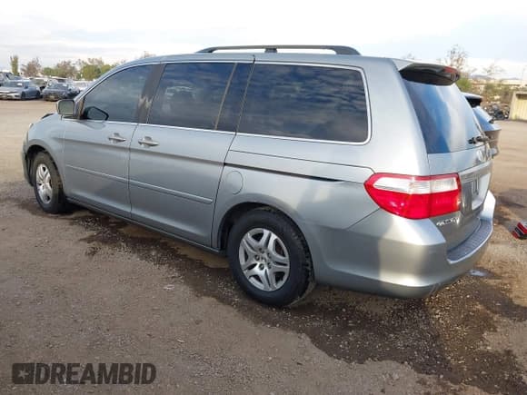 ✅ 2006 Honda Odyssey EX • VIN: 5FNRL38466B055893 • Lot: 43685604. Listed on IAAI with 199,354 mi. Free auction sales archive from the USA and detailed vehicle history report at DreamBid. Image 3.
