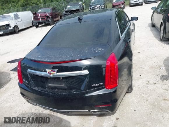 ✅ 2015 Cadillac CTS Luxury AWD • VIN: 1G6AX5SX5F0109217 • Lot: 42983192. Listed on IAAI with 54,841 mi. Free auction sales archive from the USA and detailed vehicle history report at DreamBid. Image 16.