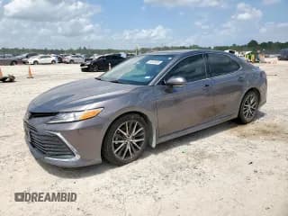 ✅ 2022 Toyota Camry XLE • VIN: 4T1F11AK6NU065671 • Lot: 60124035. Wystawiony na Copart z przebiegiem 87 295 mil. Bezpłatny archiwum sprzedaży aukcyjnych z USA i szczegółowy raport historii pojazdu na DreamBid. Zdjęcie 1.