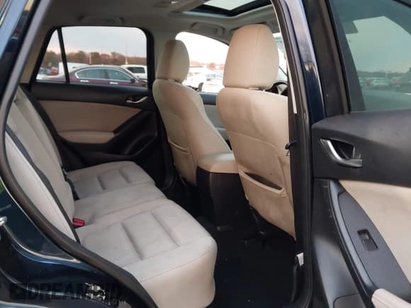 ✅ 2015 Mazda CX-5 Touring • VIN: JM3KE4CY0F0472217 • Lot: 43603807. Listed on IAAI with 159,653 mi. Free auction sales archive from the USA and detailed vehicle history report at DreamBid. Image 8.