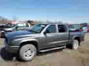 2003 Dodge Dakota Sport z VIN 1D7HG38N13S101403, wystawiony jako Copart lot #50814875 z przebiegiem 15 396 mil mil oraz Czysty tytuł • Clean title. Historia ofert i sprzedaży dostępna na DreamBid. Obrazek 1.