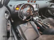 ✅ 2014 Nissan 370Z • VIN: JN1AZ4EH6EM636201 • Lot: 64480285. Wystawiony na Copart z przebiegiem 85 719 mil. Bezpłatny archiwum sprzedaży aukcyjnych z USA i szczegółowy raport historii pojazdu na DreamBid. Zdjęcie 8.