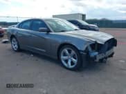 ✅ 2012 Dodge Charger Road/Track • VIN: 2C3CDXCT2CH283053 • Lot: 42171193. Listed on IAAI with 108,054 mi. Free auction sales archive from the USA and detailed vehicle history report at DreamBid. Image 1.