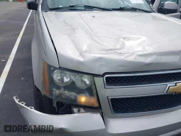 ✅ 2007 Chevrolet Suburban LTZ • VIN: 1GNFC16047R237148 • Lot: 42992308. Listed on IAAI with 248,336 mi. Free auction sales archive from the USA and detailed vehicle history report at DreamBid. Image 6.