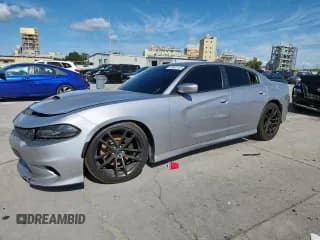 ✅ 2017 Dodge Charger R/T Scat Pack • VIN: 2C3CDXGJ6HH630027 • Lot: 85891125. Listed on Copart with 105,140 mi. Free auction sales archive from the USA and detailed vehicle history report at DreamBid. Image 1.