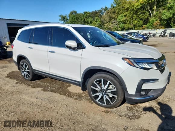 ✅ 2022 Honda Pilot Touring 7-Passenger • VIN: 5FNYF5H66NB034850 • Лот: 86515815. Опубликован ранее на Copart с пробегом 29 214 миль. Бесплатный доступ к архиву аукционных продаж из США и подробный отчёт об истории автомобиля на DreamBid. Изображение 4.