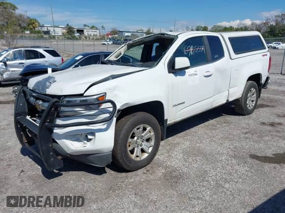 2019 Chevrolet Colorado 4WD LT z VIN 1GCHTCEN4K1175283, wystawiony jako IAAI lot #41652804 z przebiegiem 411 521 mil mil oraz . Historia ofert i sprzedaży dostępna na DreamBid. Obrazek 2.