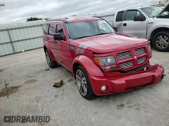 2011 Dodge Nitro Shock with VIN 1D4PT7GX7BW576298, listed as a Copart auction lot 62912865 with 125,517 mi miles and Salvage title. Bid and sale history available at DreamBid. Image 15.