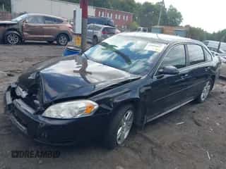 2013 Chevrolet Impala LT z VIN 2G1WB5E32D1164132, wystawiony jako IAAI lot #43044621 z przebiegiem 103 474 mil mil oraz . Historia ofert i sprzedaży dostępna na DreamBid. Obrazek 2.