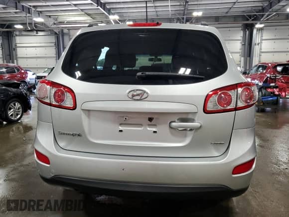 2012 Hyundai Santa Fe GLS with VIN 5XYZGDAB8CG119715, listed as a Copart auction lot 61458234 with 140,378 mi miles and Salvage title. Bid and sale history available at DreamBid. Image 6.