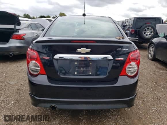 2015 Chevrolet Sonic RS с VIN 1G1JG5SB7F4175707, выставлен на аукционе Copart как лот 69455704 с пробегом 69 899 миль миль и Списание • Salvage title. История ставок и продаж доступна на DreamBid. Изображение 6.
