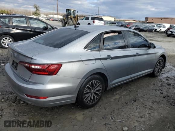 ✅ 2021 Volkswagen Jetta S • VIN: 3VWC57BU6MM049436 • Lot: 85140504. Wystawiony na Copart z przebiegiem 59 946 mil. Bezpłatny archiwum sprzedaży aukcyjnych z USA i szczegółowy raport historii pojazdu na DreamBid. Zdjęcie 3.