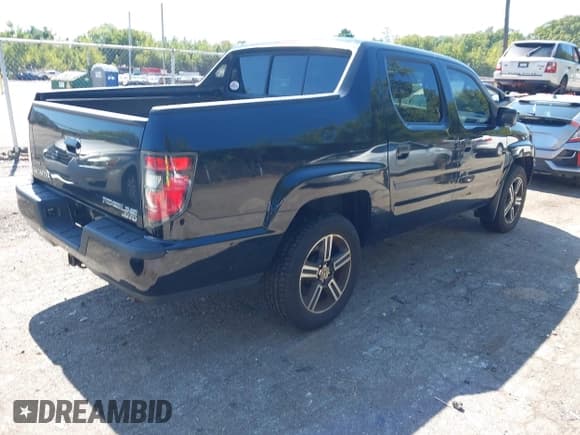 ✅ 2013 Honda Ridgeline Sport • VIN: 5FPYK1F73DB007952 • Lot: 43210748. Listed on IAAI with 273,921 mi. Free auction sales archive from the USA and detailed vehicle history report at DreamBid. Image 4.