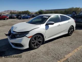 ✅ 2019 Honda Civic Sport • VIN: 19XFC2F82KE023137 • Лот: 89577985. Опубликован ранее на Copart с пробегом 117 283 миль. Бесплатный доступ к архиву аукционных продаж из США и подробный отчёт об истории автомобиля на DreamBid. Изображение 1.