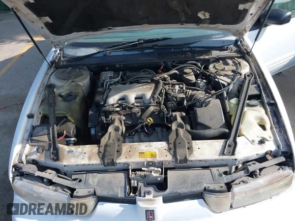 ✅ 1997 Oldsmobile Cutlass Supreme Series II • VIN: 1G3WH52M4VF327067 • Lot: 42709655. Wystawiony na IAAI z przebiegiem 176 945 mil. Bezpłatny archiwum sprzedaży aukcyjnych z USA i szczegółowy raport historii pojazdu na DreamBid. Zdjęcie 10.