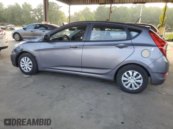 ✅ 2015 Hyundai Accent GS • VIN: KMHCT5AE8FU198755 • Лот: 69782314. Опубликован ранее на Copart с пробегом 126 663 миль. Бесплатный доступ к архиву аукционных продаж из США и подробный отчёт об истории автомобиля на DreamBid. Изображение 2.