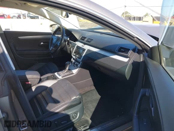 ✅ 2013 Volkswagen CC R-Line • VIN: WVWBP7AN5DE516953 • Lot: 42920630. Listed on IAAI with 107,428 mi. Free auction sales archive from the USA and detailed vehicle history report at DreamBid. Image 5.