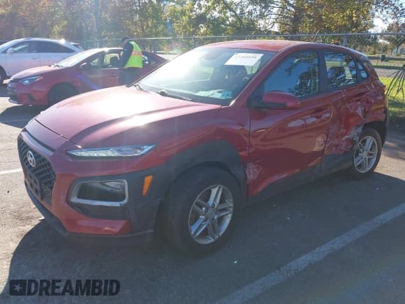 ✅ 2021 Hyundai Kona SE • VIN: KM8K1CAA9MU690596 • Лот: 43466858. Опубликован ранее на IAAI с пробегом 86 675 миль. Бесплатный доступ к архиву аукционных продаж из США и подробный отчёт об истории автомобиля на DreamBid. Изображение 2.