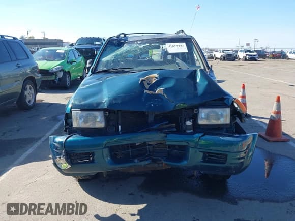 ✅ 1998 Isuzu Rodeo S • VIN: 4S2CM58W9W4337439 • Lot: 41619442. Listed on IAAI with 304,136 mi. Free auction sales archive from the USA and detailed vehicle history report at DreamBid. Image 12.