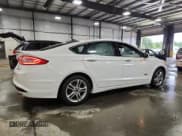 ✅ 2015 Ford Fusion Titanium • VIN: 3FA6P0SU8FR280559 • Lot: 70739355. Wystawiony na Copart z przebiegiem 148 456 mil. Bezpłatny archiwum sprzedaży aukcyjnych z USA i szczegółowy raport historii pojazdu na DreamBid. Zdjęcie 3.