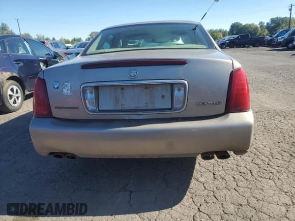✅ 2003 Cadillac DeVille • VIN: 1G6KD54Y33U148475 • Lot: 86046315. Listed on Copart with 193,632 mi. Free auction sales archive from the USA and detailed vehicle history report at DreamBid. Image 6.