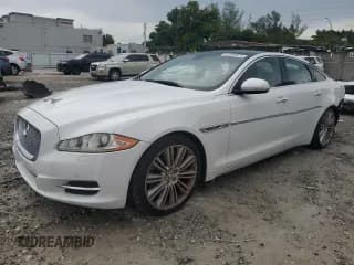 ✅ 2013 Jaguar XJ Supercharged • VIN: SAJWA1GE1DMV42254 • Lot: 81008025. Listed on Copart with 92,523 mi. Free auction sales archive from the USA and detailed vehicle history report at DreamBid. Image 1.
