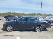 ✅ 2014 Lincoln MKS • VIN: 1LNHL9EK1EG606152 • Lot: 42104079. Listed on IAAI with 165,034 mi. Free auction sales archive from the USA and detailed vehicle history report at DreamBid. Image 14.