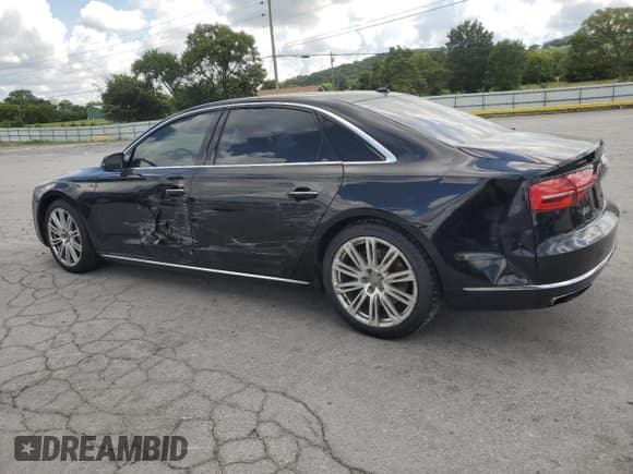 ✅ 2015 Audi A8 3.0T • VIN: WAU3GAFD9FN026565 • Lot: 66665275. Wystawiony na Copart z przebiegiem 135 086 mil. Bezpłatny archiwum sprzedaży aukcyjnych z USA i szczegółowy raport historii pojazdu na DreamBid. Zdjęcie 2.