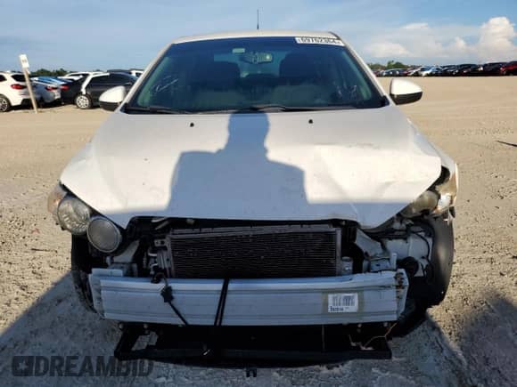 2014 Chevrolet Sonic LT с VIN 1G1JC5SHXE4158446, выставлен на аукционе Copart как лот 69762364 с пробегом 125 356 миль миль и Списание • Salvage title. История ставок и продаж доступна на DreamBid. Изображение 5.