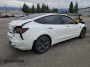 ✅ 2022 Tesla Model 3 • VIN: 5YJ3E1EAXNF153340 • Lot: 93313555. Wystawiony na Copart z przebiegiem 33 005 mil. Bezpłatny archiwum sprzedaży aukcyjnych z USA i szczegółowy raport historii pojazdu na DreamBid. Zdjęcie 3.