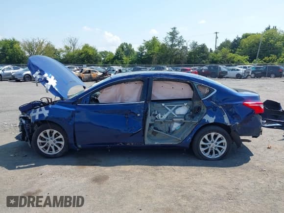 ✅ 2019 Nissan Sentra SV • VIN: 3N1AB7AP1KY358447 • Lot: 42869103. Listed on IAAI with 124,000 mi. Free auction sales archive from the USA and detailed vehicle history report at DreamBid. Image 15.